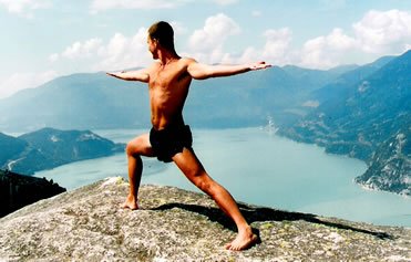 Warrior two on the mountain warrior 3 pose