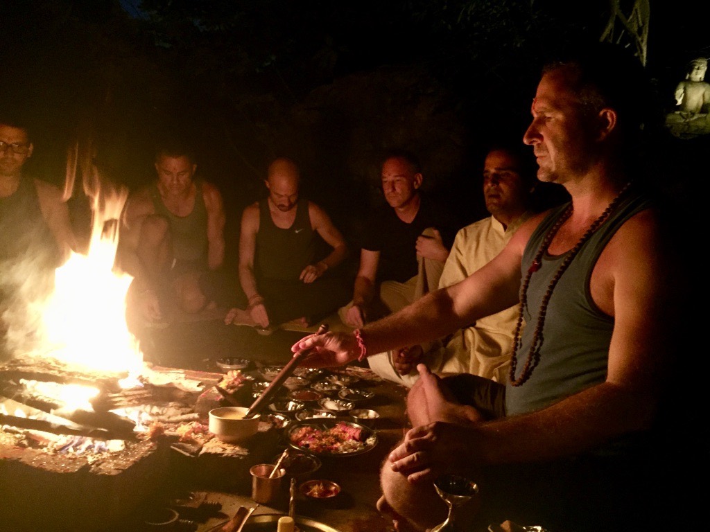 Yogi Aaron doing a fire ritual Yogi Aaron teaching yoga India pilgrimage Blue Osa guided spiritual journey