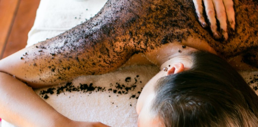 person receiving a back massage. DIY body scrubs