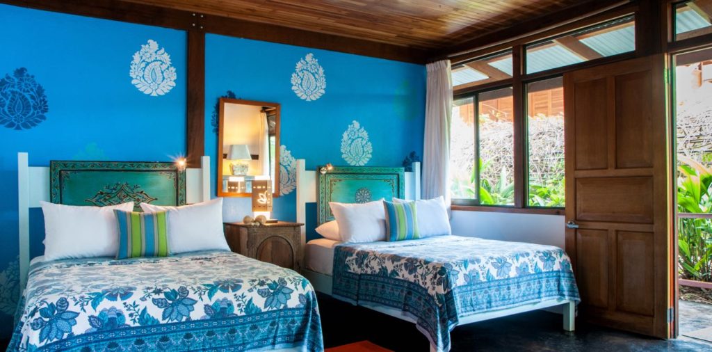 Simple eco-friendly cabin accommodations at Blue Osa yoga retreat in Costa Rica
