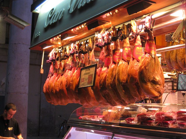 jamón serrano / ibérico (spanish ham) hanging @ boquería market, barcelona traditional spanish dishes