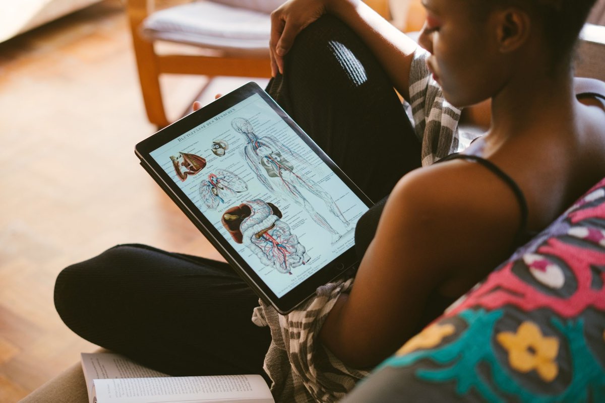 AYAMA yoga teacher training student studying anatomy