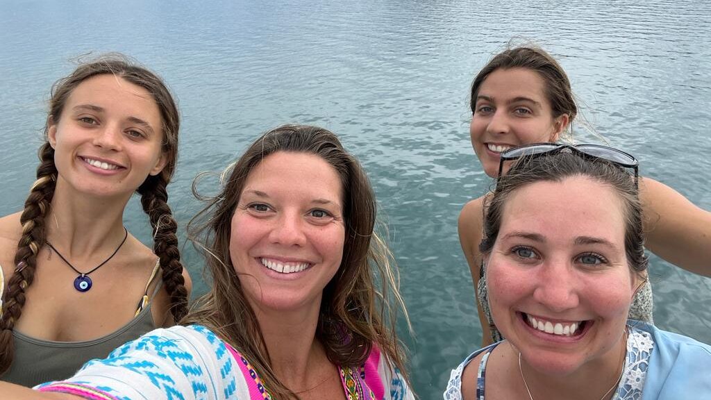 Carly on a boat in Costa Rica with three of Blue Osa's volunteers. 