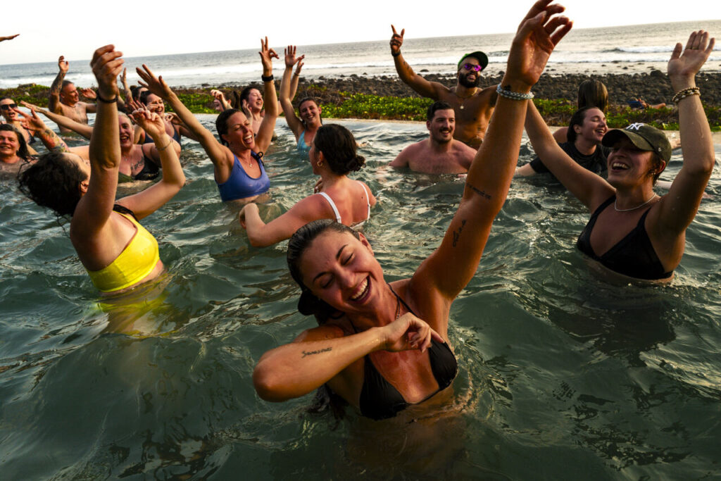 get salty yoga retreats with Erin Harris at Blue Osa yoga teacher training group having fun should I take a yoga teacher training