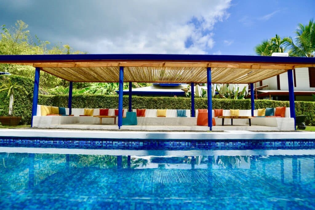 shaded area by the pool at blue osa, working vacation work while on a yoga retreat