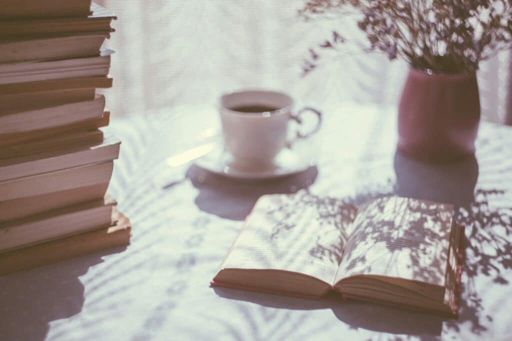 Photo by freestocks - Open book and coffee