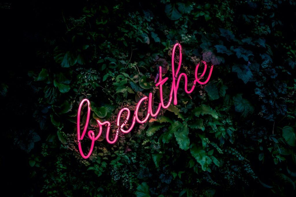 pink breathe neon sign
breath work yoga for overcoming fears yoga for personal transformation
