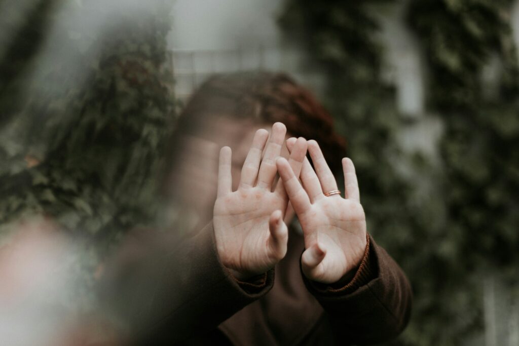 hands blocking face five kleshas yoga for personal transformation yoga for overcoming fears yoga philosophy